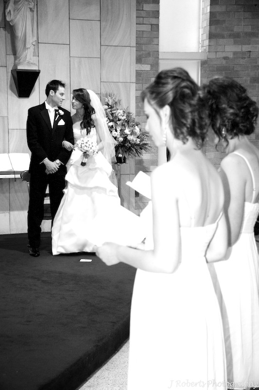 Bride and groom sharing a moment during the wedding ceremony - wedding photography sydney